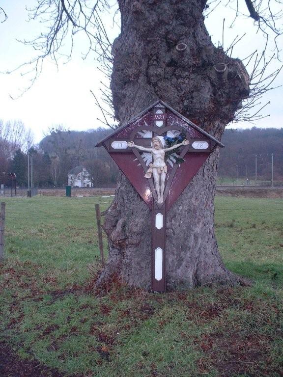 a cross next the path